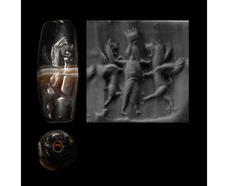 6th-4th century B.C. Biconical with median gusset, showing a standing ling grasping the throat of two rearing gryphons; suppl