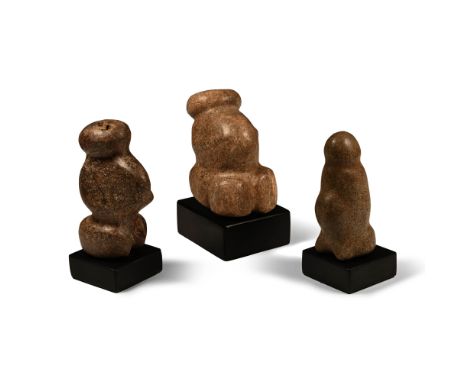 Neolithic Period, circa 6th-4th millennium B.C. or later Comprising two pregnant female figures with emphasised rounded stoma