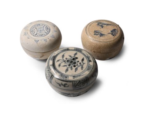 15th century A.D. Comprising three powder boxes, two with painted floral motifs, one with a landscape to the lid. Cf. Chunmin