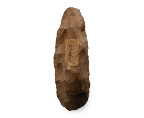 Neolithic Period, circa 6,000 B.P. Lentoid in section with rounded blade. old collector's label 'Brecy'.  154 grams, 12.1 cm 