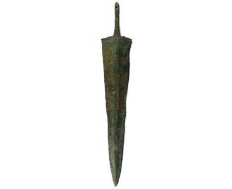 1800-1600 B.C. Tapering blade with raised midrib developing to a short tang pierced at the finial. Cf. for the type Gorelik, 