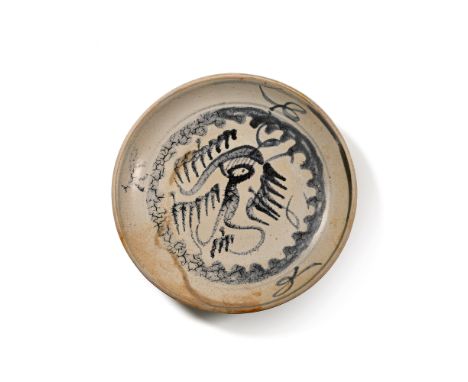 Early 19th century A.D. A shallow plate with painted tendrils and feather design decoration to the upper face.  283 grams, 17