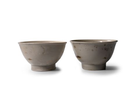 15th century A.D. Comprising two cream glazed bell-shaped bowls with large petals surrounding the foot. Cf. The Bach, N., Vie