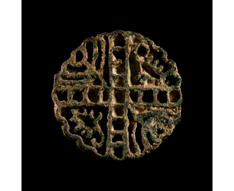 Circa 2200-2000 B.C. Discoid with strap handle to the rear, accompanied by typed and signed note by the late W.G. Lambert, Pr