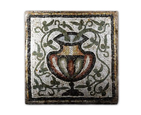 4th-6th century A.D. An attractive rectangular panel of mosaic tesserae with central ribbed kantharos executed in coral pink,
