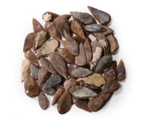 Neolithic Period, circa 6th-4th millennium B.C. Comprising mostly bifacial and uniface leaf-shaped flint and chert arrowheads