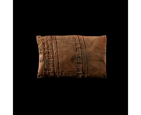 19th-16th century B.C. Pillow-shaped with band of impressed cuneiform text to upper edge and partial band to the middle. 124 