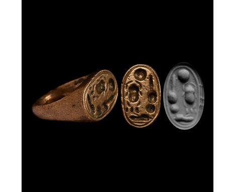 New Kingdom, 18th Dynasty, 1353-1336 B.C. A 'stirrup' type ring with a substantial oval-shaped bezel bearing the name of Phar