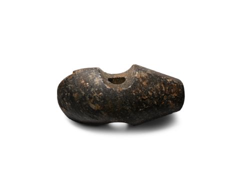 Neolithic Period, 6th-4th millennium B.C. Finely formed axehead in a dark diorite with asymmetric convex cutting edge, with p