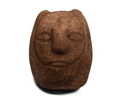 20th century A.D. Comprising bulbous head and body, low-relief facial features, arms forming a horizontal band; traces of pig