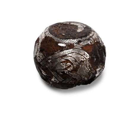 9th-11th century A.D. Polyhedral weight bearing Insular Style inlaid decoration in the form of serpentine creatures in tondos