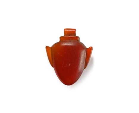 New Kingdom, 1550-1070 B.C. A large heart, ib, amulet of classic egg-form with shallow lugs on either side with short flared 