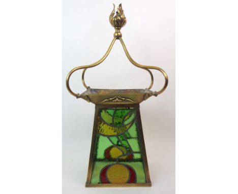 An Arts and Crafts hall lantern of leaded and stained glass construction within a brass frame, stamped Rd No 450034 to top, 6
