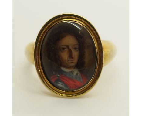A portrait miniature ring possibly the portrait of William III Prince of Orange, in regency style yellow metal mount, with do