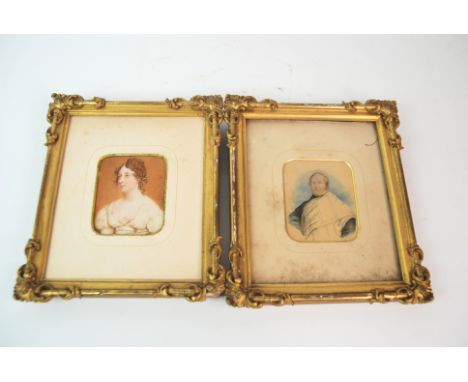 A painted portrait miniature of William Bisset Esq and another of Lady Bisset, both framed and glazed and ivory handled famil