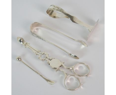 A pair of George III silver sugar nips by William Justus, London circa 1762, 11.5cm long, with a silver pusher, Birmingham 19