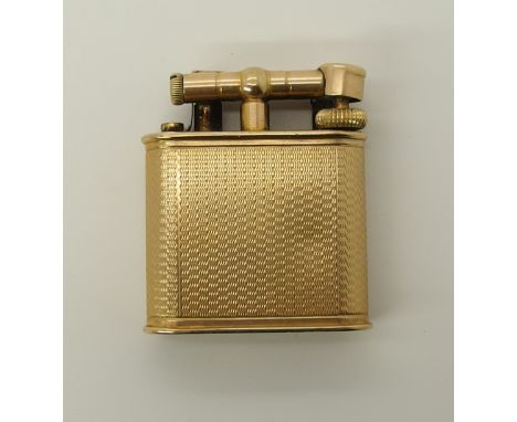 A 9ct gold vintage Dunhill lighter with engine turned decoration to the body, weight 41.7gms, dimensions 4.4cm x 3.7cm x 1.2c
