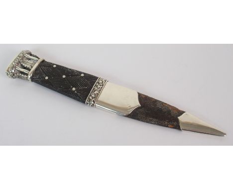 A silver mounted skean dhu by McDougall's, London, hallmarked for Edinburgh 1915, the hilt with crosshatch and beaded decorat