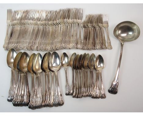 A composite part set of Irish silver cutlery by James England, Dublin 1819 and Christopher Eades, Dublin 1822, retailed by M.