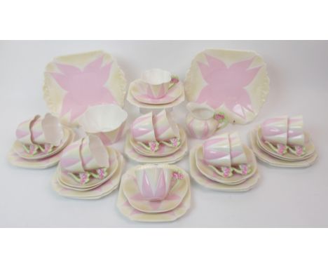 A Shelley Floral Dainty Shape Star Segments teaset in pink and pale yellow colourway, comprising twelve cups, saucers and sid