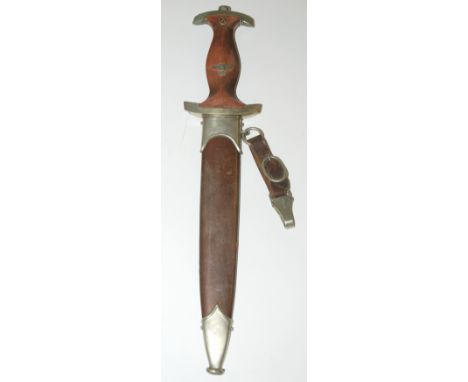 A WWII German SA dagger the blade with motto and marked "Carl Grah Solingen - Ohligs" the cross guard and scabbard numbered 1