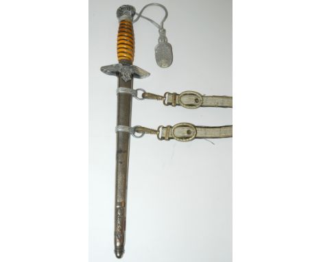 A Third Reich Luftwaffe Officer's dress dagger with hanger the wire bound ivorine grip with Swastika and acorn decorated pomm