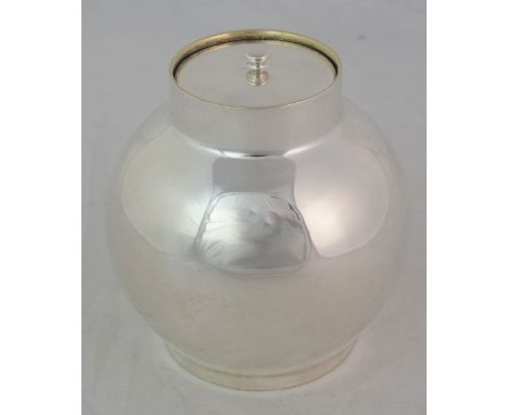 A sterling silver tea caddy by Tiffany & Company, of plain globular form marked on the base Tiffany & Co 4824 M 2621 sterling