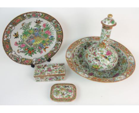 A Cantonese famille rose bedroom set comprising; a bottle shaped ewer and cover (large chip to cover and foot rim chip), 38cm
