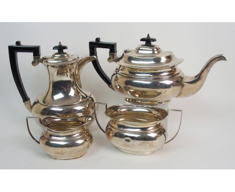 A four piece silver tea service by Francis Howard Limited, Sheffield 1933, of plain rounded rectangular form, the hot water p