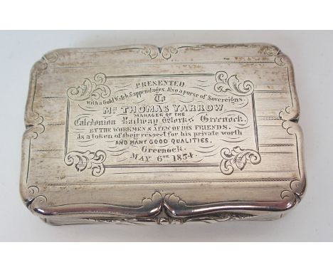 A silver snuff box by Nathaniel Mills, Birmingham 1852, of shaped rectangular form with engine turned decoration, the hinged 