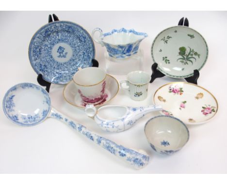 A collection of 18th and 19th Century porcelain including a puce painted cup and saucer, a blue and white saucer decorated wi