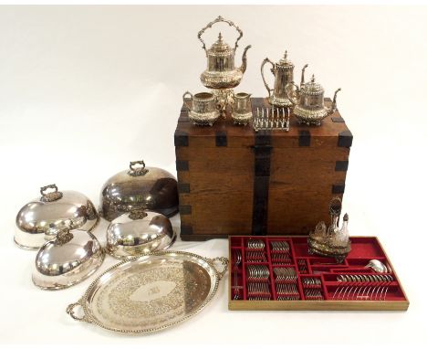 A Victorian iron bound oak silver chest containing; a suite of silver cutlery by Robert Stewart, Sheffield 1858, single struc