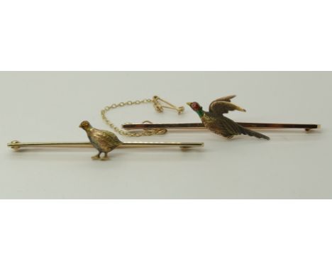 Two 15ct gold and platinum game bird brooches a pheasant with enamelled head and a ruby set eye, length 6cm, weight 4.9gms to