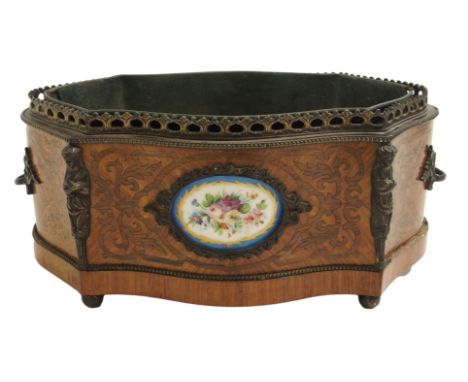 A French kingwood, rosewood and gilt metal mounted planter with pierced rail above sevres-style foliate panels flanked by car