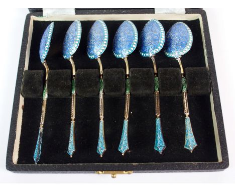 A set of six silver gilt and blue enamel coffee spoons by Turner & Simpson, Birmingham 1932, in fitted case, 11cm long, 3oz