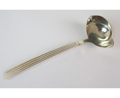 A Danish sterling silver sauce ladle by Georg Jensen in the Bernadotte pattern with double lipped bowl, monogrammed BJB on th