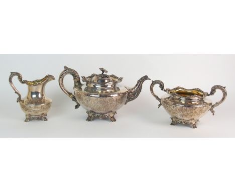 An early Victorian three-piece silver tea service by James McKay, Edinburgh 1838, of squat circular form with engraved floral