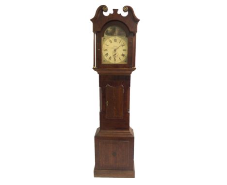 An oak and ebony line inlaid longcase clock with enamel dial by Fletcher, Kirbymoorside, with Una and The Lion above floral s