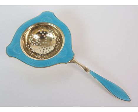 A Norwegian silver and blue enamel tea strainer marked 925, made in Norway, 12.5cm long, 2oz