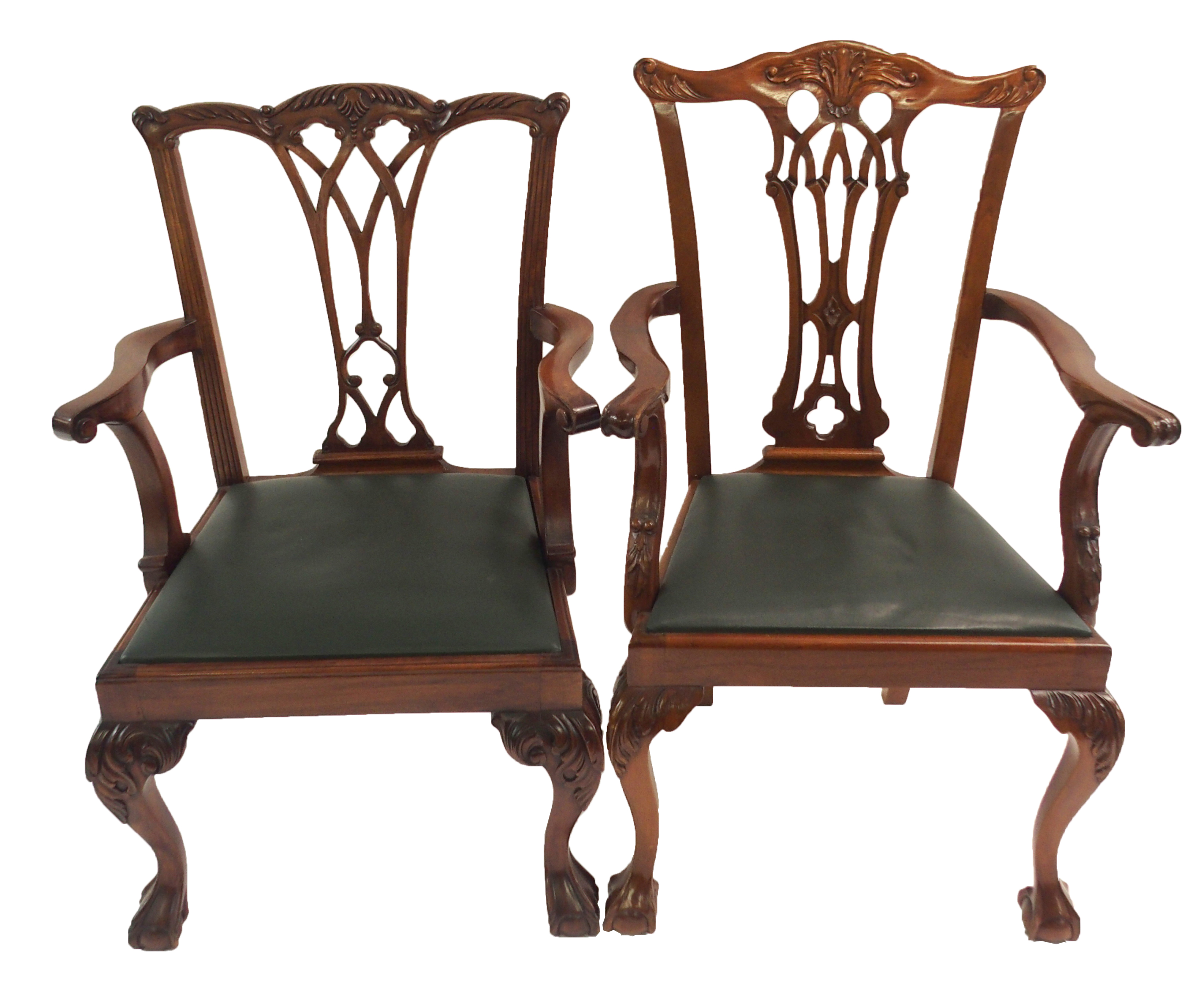 A set of twelve reproduction Chippendale style stained dining chairs