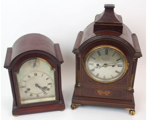 An Edwardian inlaid mahogany mantle clock the silvered dial with Roman numerals and marked R & W Sorley, Glasgow, together wi