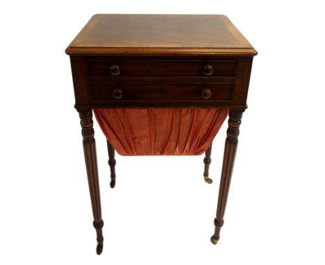 A Victorian mahogany and rosewood crossbanded sewing table with two drawers above a silk bag drawer and on turned knop and fl