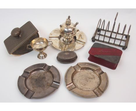 An Edwardian silver table taper lighter / ashtray by James Dixon & Son, Sheffield 1908, of half ribbed spherical shape on int