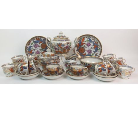 A Newhall Tobacco Leaf pattern tea service comprising teapot, sucrier, milk jug, slop bowl, two cake plates, six saucers and 