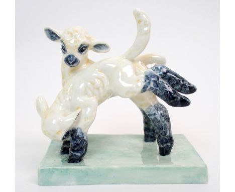 A Royal Worcester group 'Maytime' by Doris Lindner, modelled as two lambs, on a green shaded base, no. 3123, green printed fa