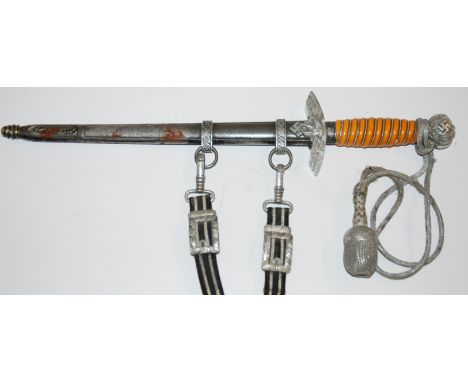 A Third Reich Luftwaffe Officer's dress dagger with hanger the wire bound ivorine grip with Swastika and acorn decorated pomm