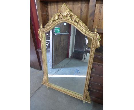 A reproduction French Louis XV style gilt mirror