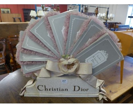 A Christian Dior display stand