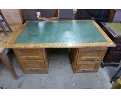 A light oak pedestal desk