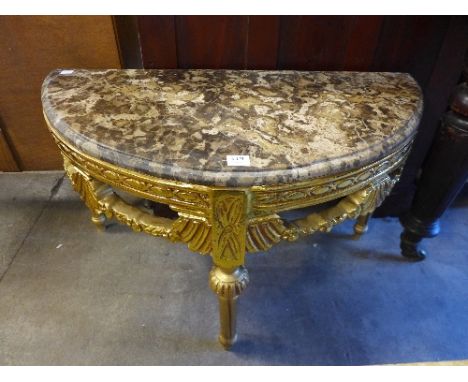 A reproduction French Louis XV style gilt console table